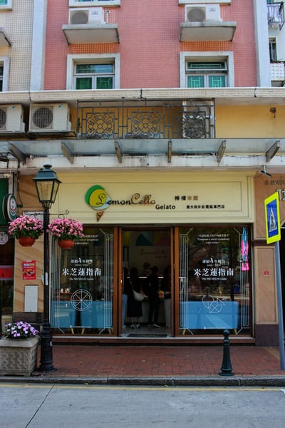 A gelato shop on a Macau street, people at the counter inside